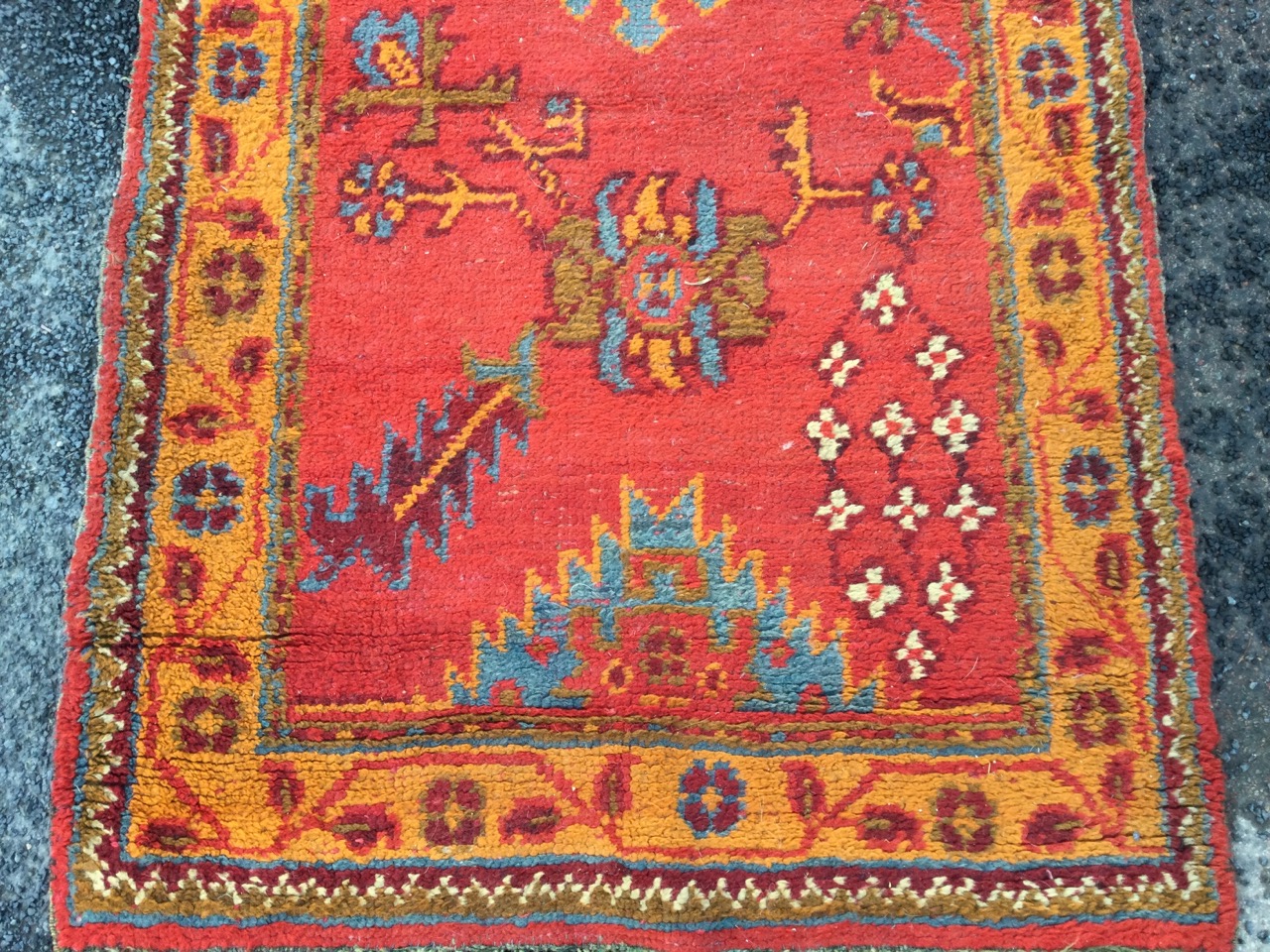 A Turkey runner, the red field woven with serrated, star & floral motifs framed by orange border - Image 3 of 3