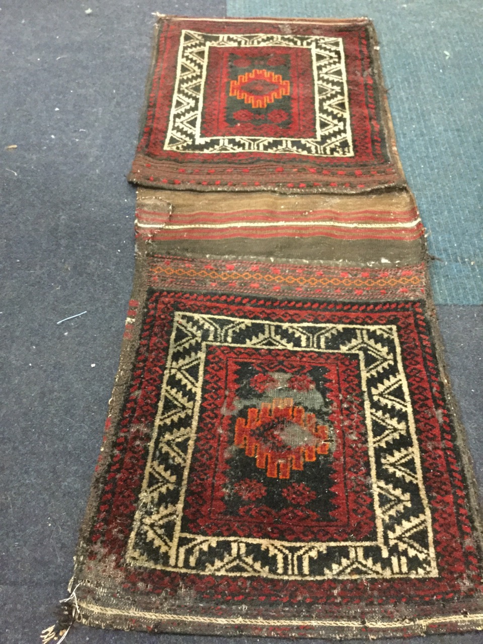 A nineteenth century bokarra saddlebag, the two square pockets woven with square panels framed by