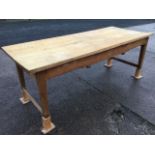 A Victorian kitchen table, the rectangular two plank chestnut top on dowel jointed pine base with