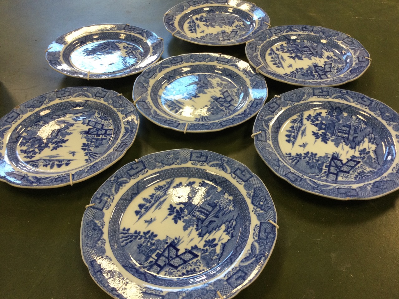 A set of seven nineteenth century blue & white pearlware plates decorated with chinoiserie landscape - Image 3 of 3