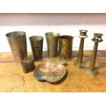 A 1918 Berndorf M15 shell case; a pair of heavy trench brass hexagonal tapering candlesticks;