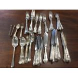 A quantity of silver plated flatware, mainly in the Queens pattern with shell scrolled handles -