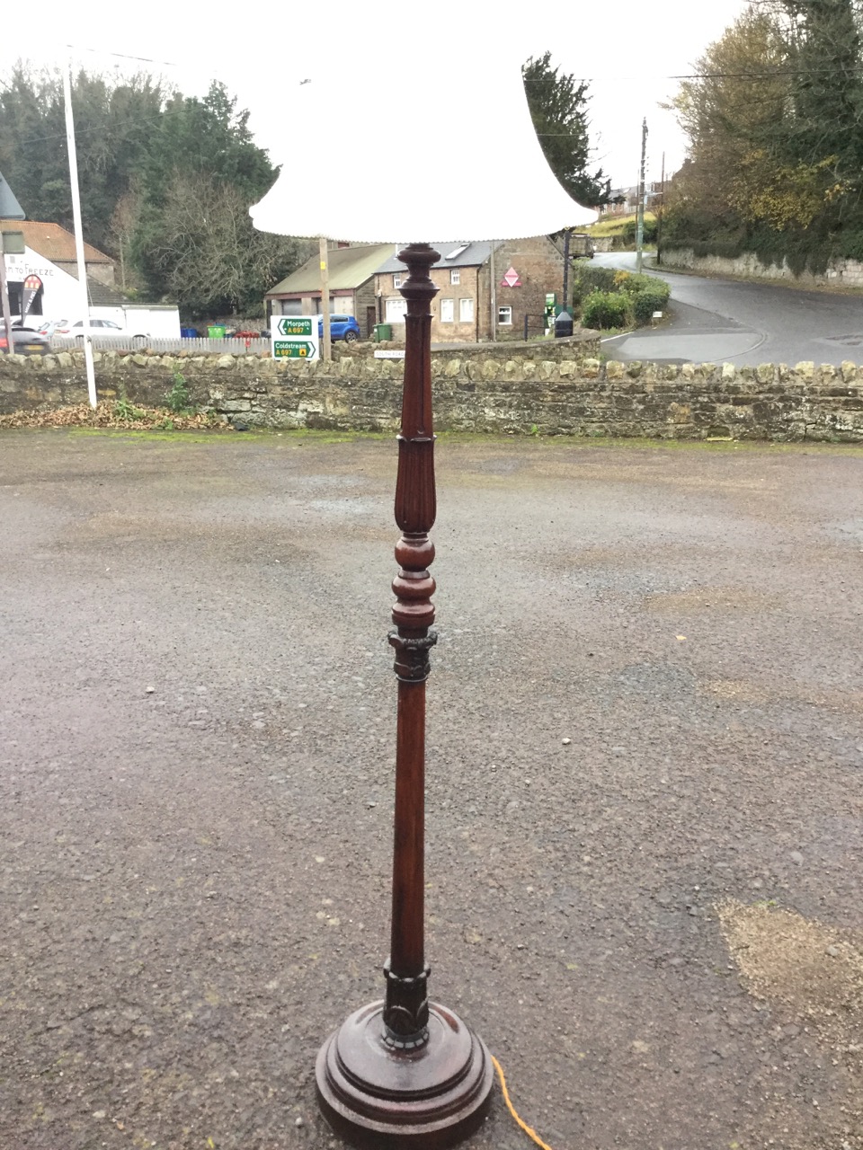 A carved mahogany standard lamp, with fluted turned leaf carved tapering column on circular - Image 2 of 3