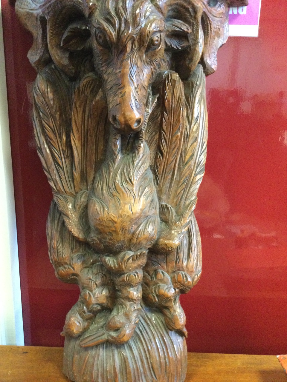 A carved hardwood wallshelf, the ‘D’ shaped moulded top on a corbel carved with feathered game & - Image 3 of 3