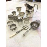 Miscellaneous hallmarked silver including a Georgian cream jug, two egg cups, two pairs of napkin