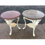 Two similar Victorian cast iron pub type Britannia tables, the circular wood tops on three pierced