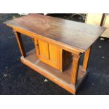 A Victorian rectangular oak and grained pine hall table, the moulded top on four fluted columns with