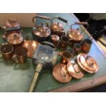 A collection of Victorian copper including kettles, pans, measures, tankards, bowls, lids, a pierced