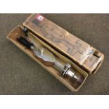 A boxed Dr Macaura’s pulsoconn blood circulator, the working vibrator with wood handles. (16in)