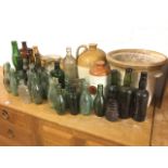 A collection of old bottles - Selkirk, Hamilton, Jedburgh, ribbed, Benedictine, skittle shaped,