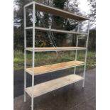 A set of metal framed storage rack with five rectangular wood shelves,