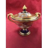 A fine Royal Crown Derby urn & cover decorated in the traditional floral blue, gilt and brick red