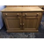 A maple & pine sideboard, with rectangular top above two knobbed frieze drawers and panelled