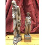 An Argentinian carved walnut vernacular figure with plaque dated 1952, signed M De Marchi; and a