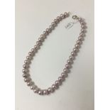 Cultured freshwater pink pearl necklace with a string of 11.5-12.5mm diameter freshwater cultured