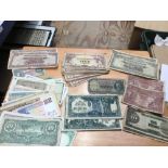 Banknotes selection of WW2 Japanese Government invasion currency with values to $ 1000 (x2) $