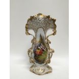 Late 19th century Continental porcelain vase of shaped form with central hand painted scene