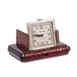 1930s Art Deco Tavannes travelling watch in snakeskin covered silver cased this end pushers to open