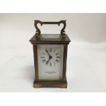 Good quality Charles Frodsham brass cased carriage clock, twin reeded pilasters, four bevelled