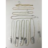 Nine strings of freshwater cultured pearls, some with clasps