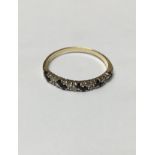 Sapphire and diamond half eternity ring in 18ct gold setting