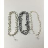 Three Keshi freshwater cultured pearl necklaces with silver clasps