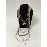 Five freshwater pink cultured pearl necklaces with silver clasps