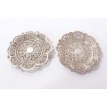 Pair of late 19th/early 20th century Indian white metal dishes of flower head form.