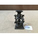 19th century Indian bronze figure of a seated deity with snakes on retangular stepped base 10cm