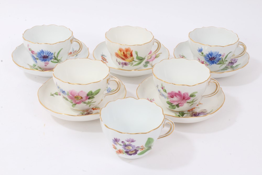 Set of six 19th century Meissen floral painted cups and five saucers