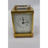 Contemporary brass carriage clock by De La Grense, Oxford with winding key