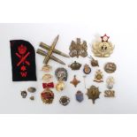 Two First World War French Yellow metal sweetheart brooches, together with other military badges