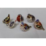 Six Royal Crown Derby paperweights including Red Legged Partridge, Chaffinch, Robin and Chelford
