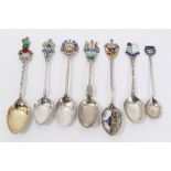 Seven silver and enamel souvenir spoons