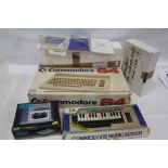 Commodore 64 together with various other accessories including Music maker