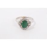 Emerald and diamond cocktail ring in 18ct white gold setting