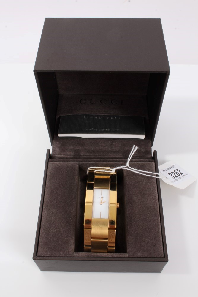 Gucci gilt stainless steel wristwatch with rectangular white dial, numbered 0011200, boxed - Image 3 of 3