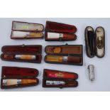 Collection of eight cheroot holders, including one with a 9ct gold mount