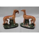 Pair of 19th Century Staffordshire figures of Greyhounds (2)