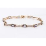 9ct gold mystic topaz and diamond bracelet