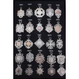 Collection of twenty five Victorian and later silver watch fobs