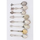 Eight silver souvenir/commemorative spoons