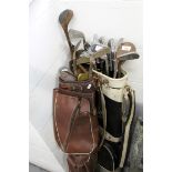 Collection of thirty three vintage golf clubs