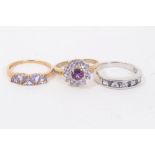 Three 9ct gold purple stone dress rings