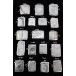 Collection of eighteen Victorian and later silver Vesta cases