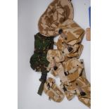 Collection of various military camouflage uniform pouches and various accessories (1 box)