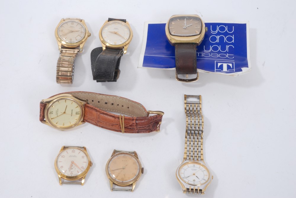 Two gold plated Ebel wristwatches and five other watches