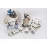 Large Lladro porcelain clown bust, Lladro figure of lady with geese, four other Lladro geese and a