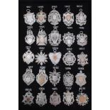 Collection of twenty five Victorian and later silver fobs