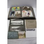 Collection of vintage postcards in album and loose, together with other ephemera